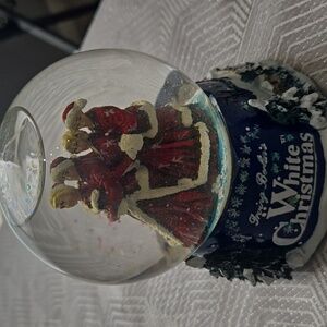 Snow Globe with Red and White Figures